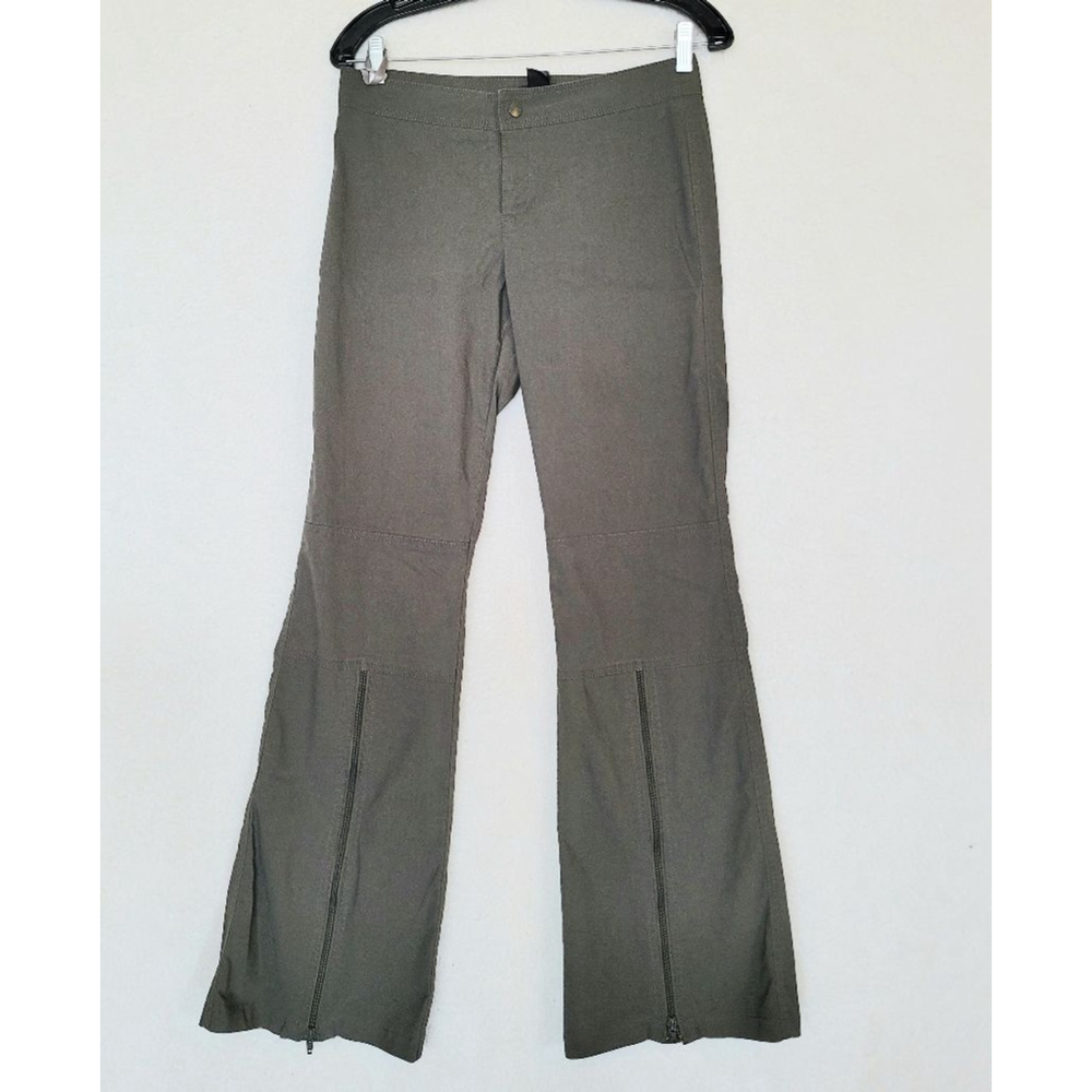 Mexx pants for women. Size 4, flare leg with zippers, snap close missing button